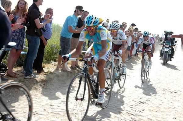 Defending Tour champion Alberto Contador (Astana) tackles the final section of cobbles at Haveluy/