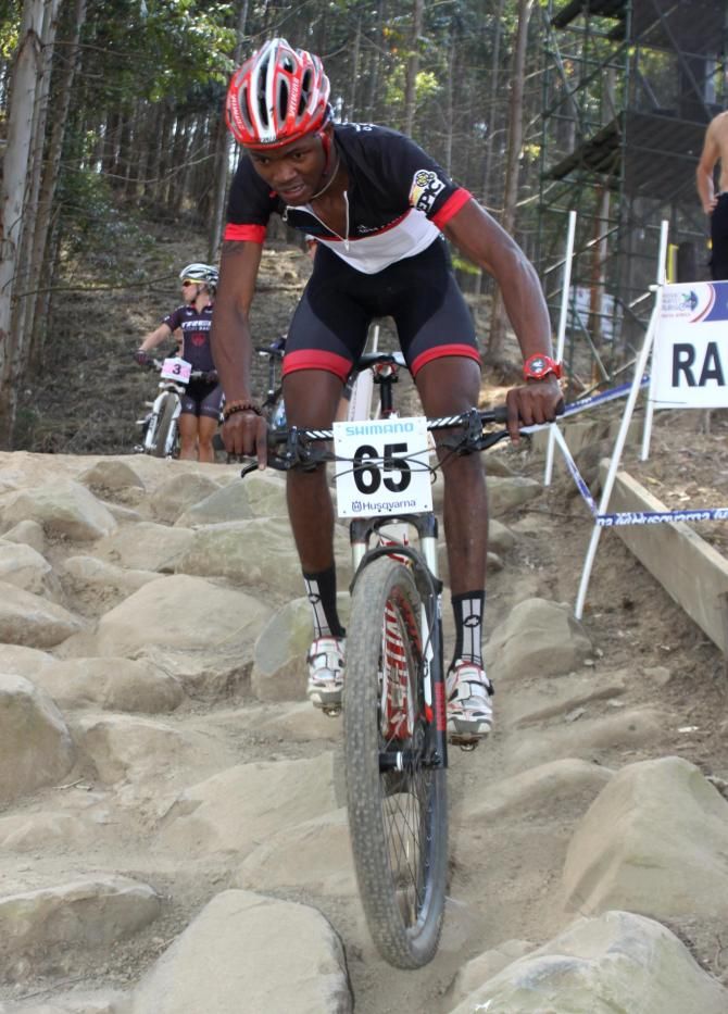 South Africa's William Makgopo successfully negotiates one of the many technical sections of the cross country course