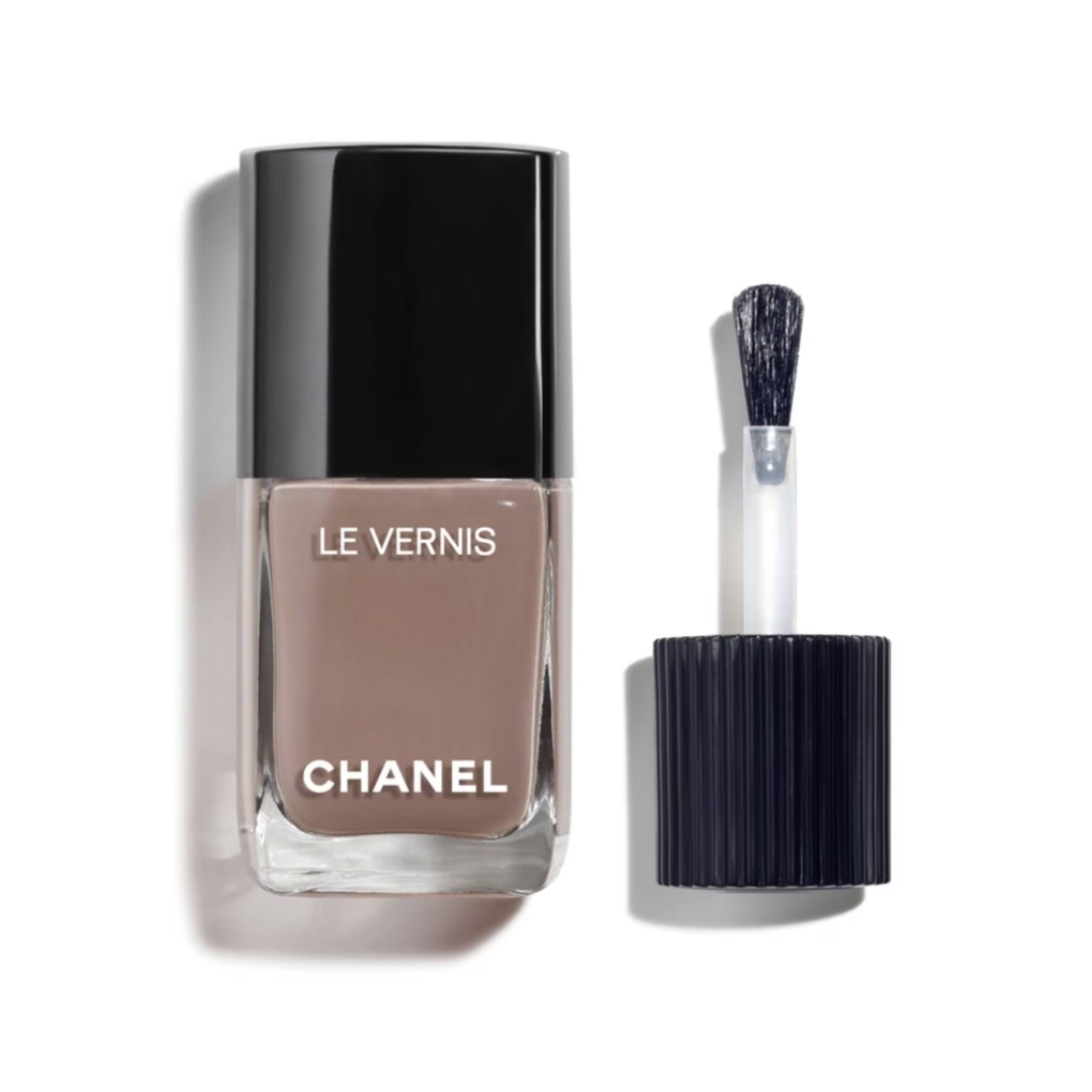 A product shot of the Chanel LE VERNIS Longwear Nail Colour in Shade 105 Particuli&amp;egrave;re (a muted taupe-brown shade), on a white background 