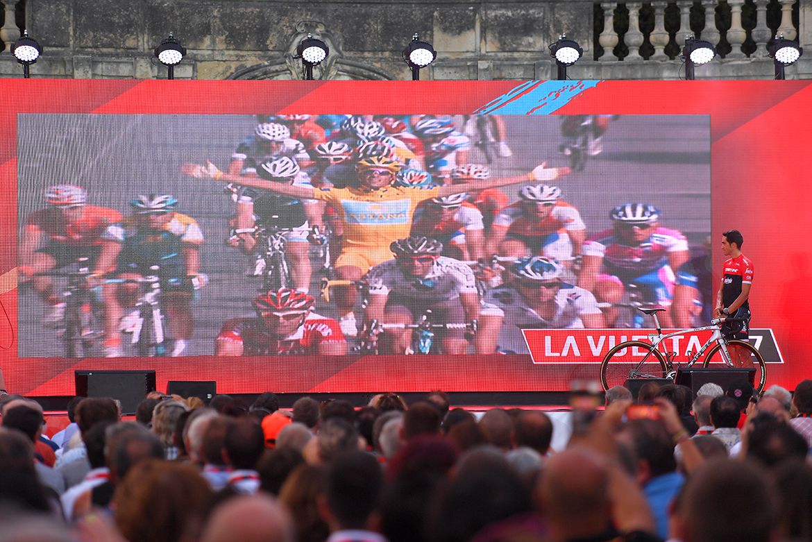 Soon-to-be-retired Alberto Contador on the stage as his career highlights are played on the screen
