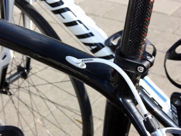 The rear housing stop unbolts from the frame for easier routing of the cable.