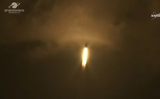 The SES-14 telecommunications satellite, carrying NASA's GOLD mission, and the Al Yah 3 communications satellite launched aboard Arianespace's Ariane 5 rocket from French Guiana Jan. 25, 2018.