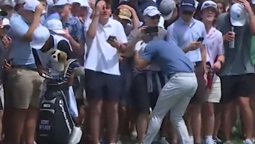 Rory McIlroy ducks for cover at the Truist Championship 