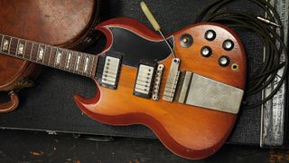Vintage Gibson SG with case and cables