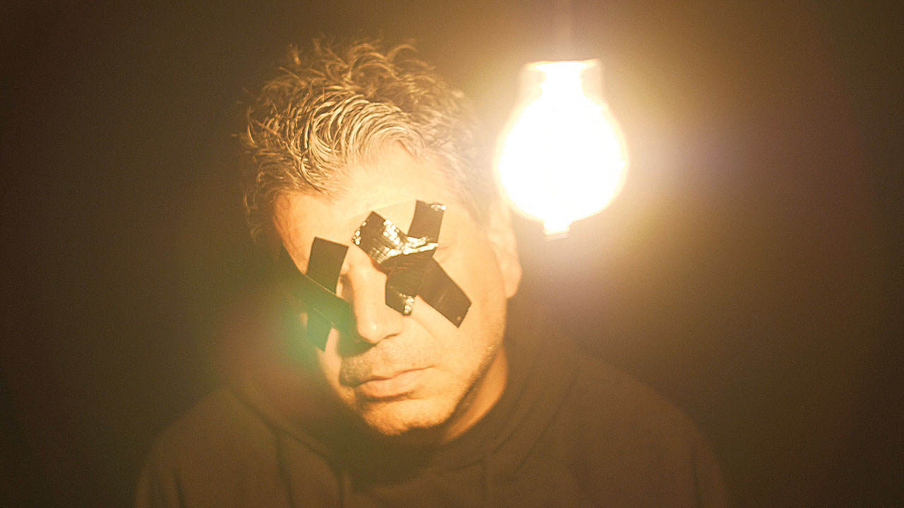Lonely Robot's John Mitchell with eyes gaffa taped