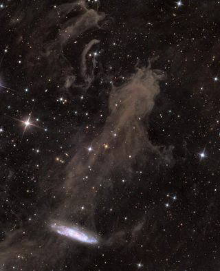 Spiral Galaxy NGC 7497 and the Integrated Flux Nebula