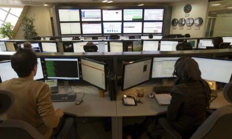 Technicians monitor internet sites in Tehran: Iran is developing a completely isolated national internet service designed to keep out Western influence. 