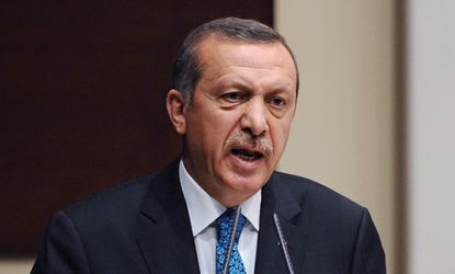 Erdogan addresses his party members in Ankara on June 14.