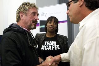 John McAfee, from left, and his wife, Janice Dyson, speak with Jai Hudes during the C2SV Technology Conference