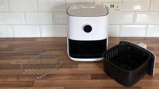 Mi Smart Air Fryer on a kitchen countertop with the frying basket removed