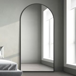 Arch mirror on neutral wall