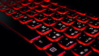 Keyboard with red-glowing keys