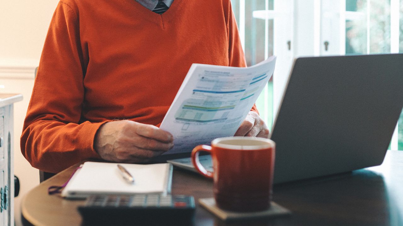 Retired man checking savings