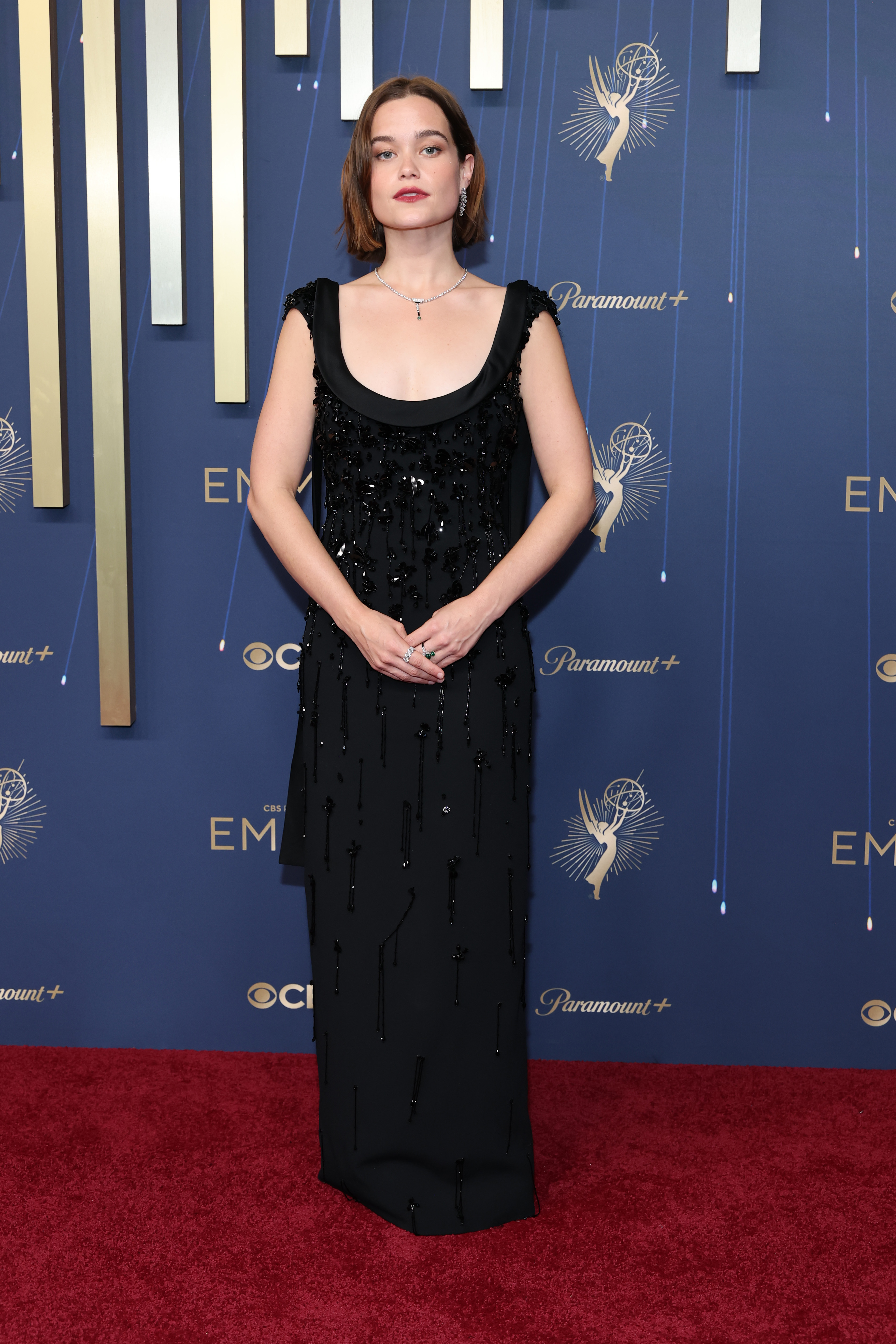 Sarah Catherine Hook in a black dress on the red carpet
