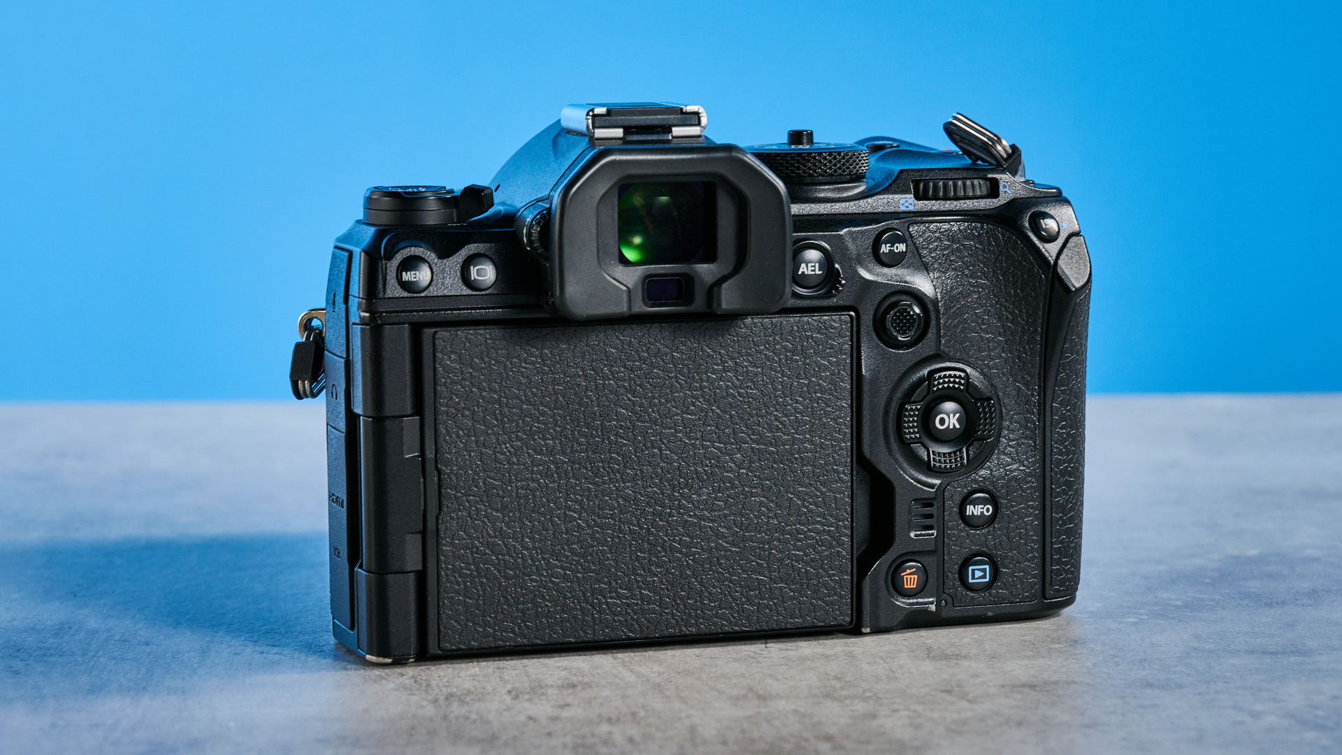 A black OM System OM-1 Mark II Micro Four Thirds mirrorless camera