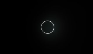 With annular solar eclipses, the moon doesn't cover all of the sun. Instead, it leaves a brilliant "ring of fire" visible around its edge. The 2020 annular solar eclipse occurred on June 21, 2020. In this image, you can see the eclipse as it appeared on June 21, 2020 from Xiamen, Fujian Province of China.