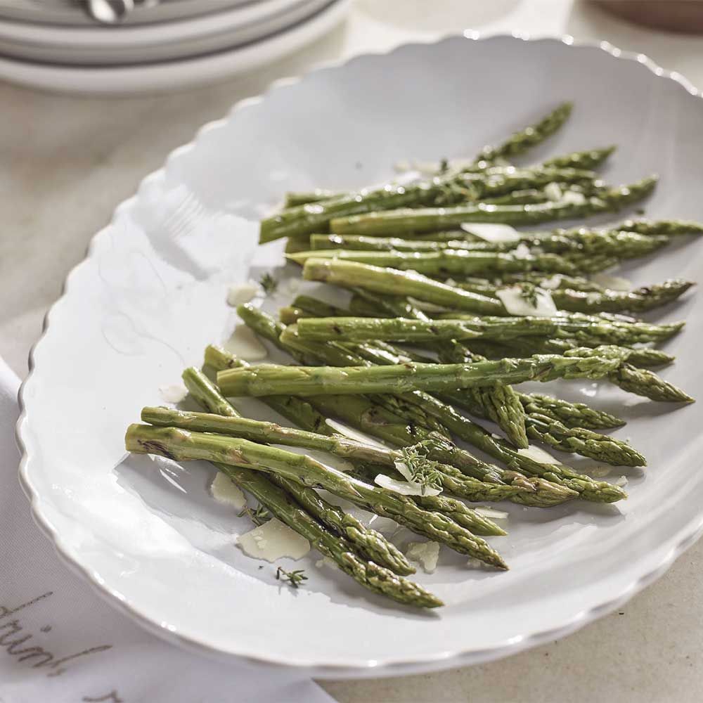 white scalloped edge serving platter to suggest a quiet luxury garden accessory
