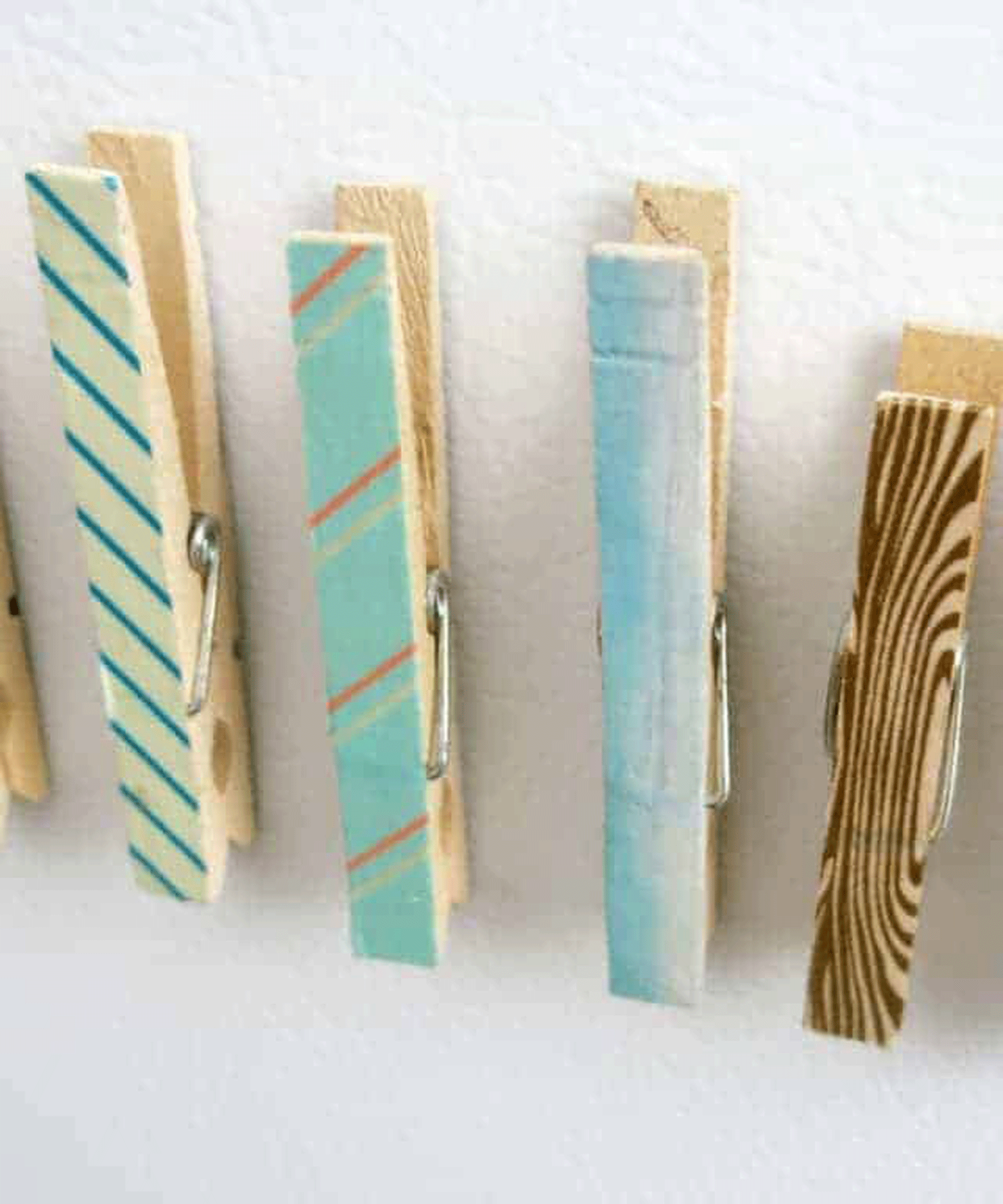 Easy DIY washi tape clothespins in patterned designs.
