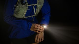 Photo taken at night of the Garmin Enduro 3 with the LED flashlight on.