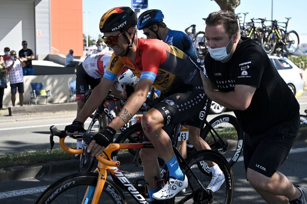 Team Bahrain rider Italys Damiano Caruso is helped after crashing during the 10th stage of the 107th edition of the Tour de France cycling race 170 km between Le Chateau dOleron and Saint Martin de Re on September 8 2020 Photo by AnneChristine POUJOULAT AFP Photo by ANNECHRISTINE POUJOULATAFP via Getty Images