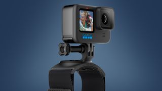 A GoPro Hero 10 Black on a wrist mount