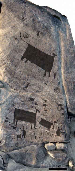 A drone took an image of this panel of rock art. Researchers used a digital overlay to help fill in the images. Note that north is at the bottom of the photo.