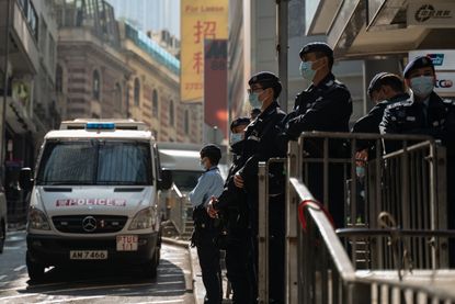 Hong Kong police arrest democracy advocates
