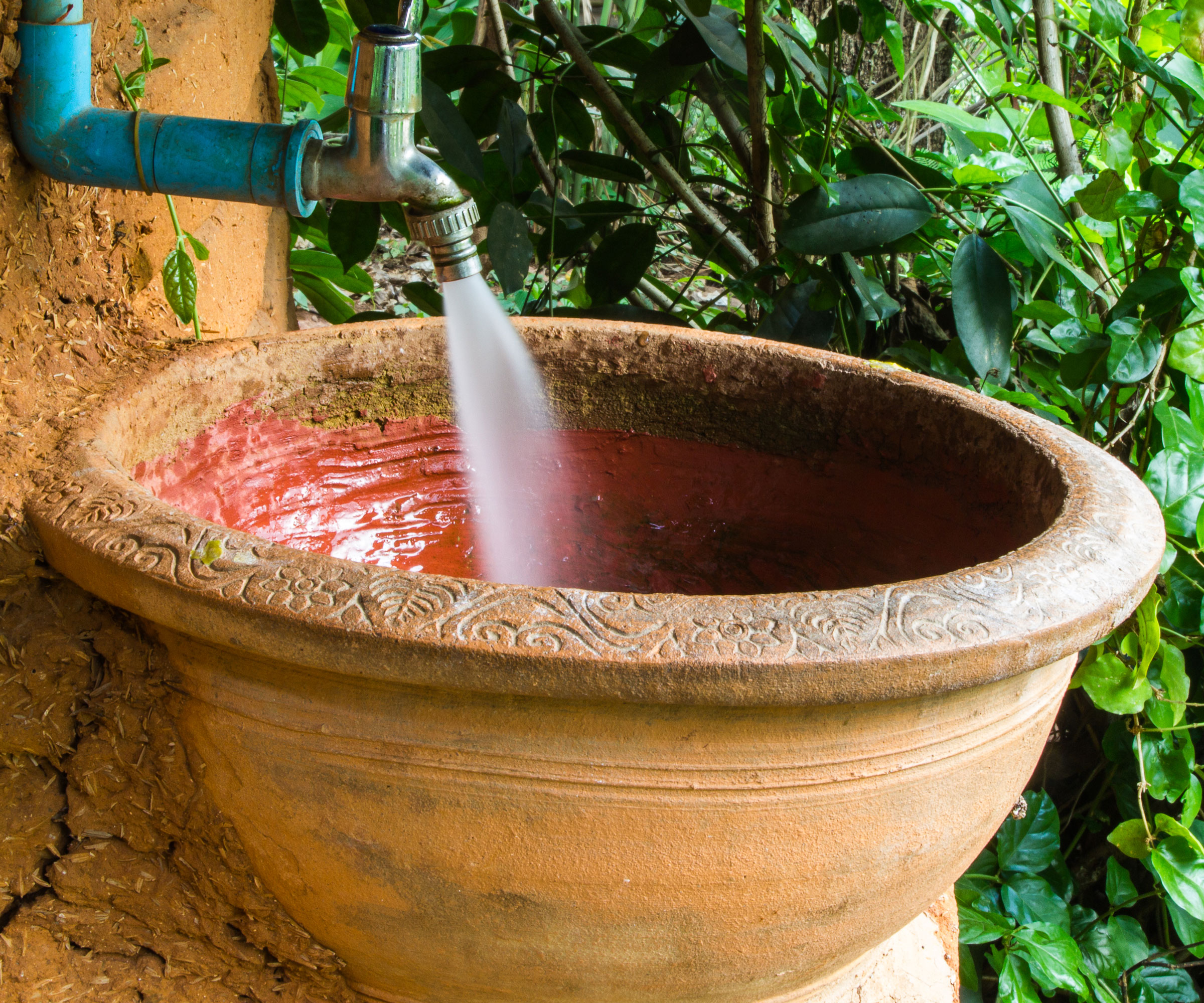 terracotta pot and garden tap