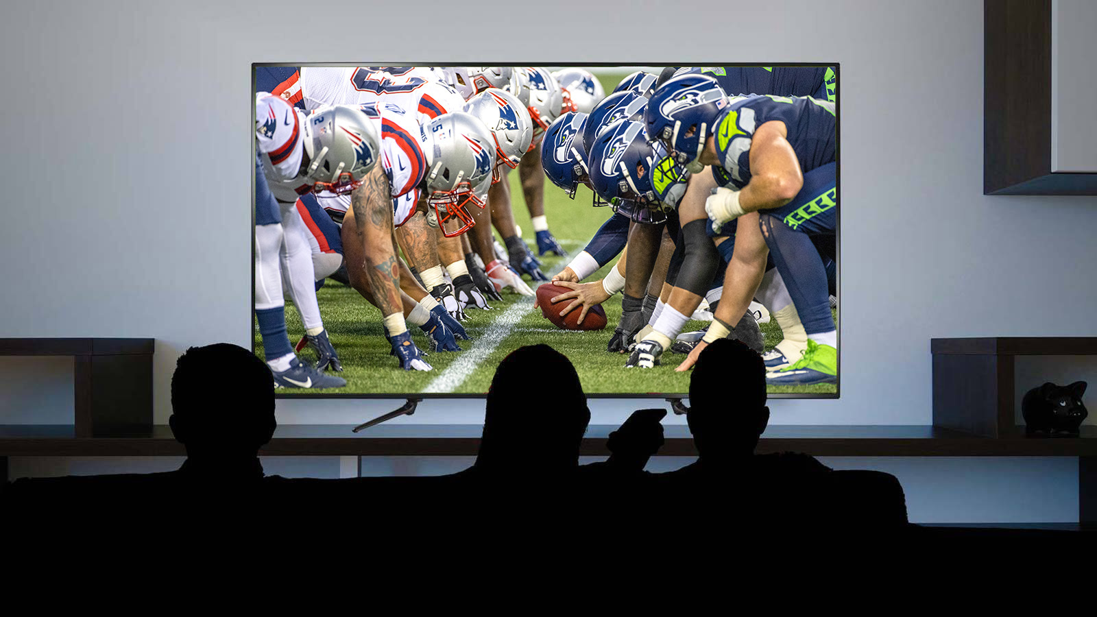 The Patriots vs the Seahawks on a TV.