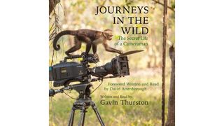Cover of Journeys in the Wild featuring monkey climbing over a camera