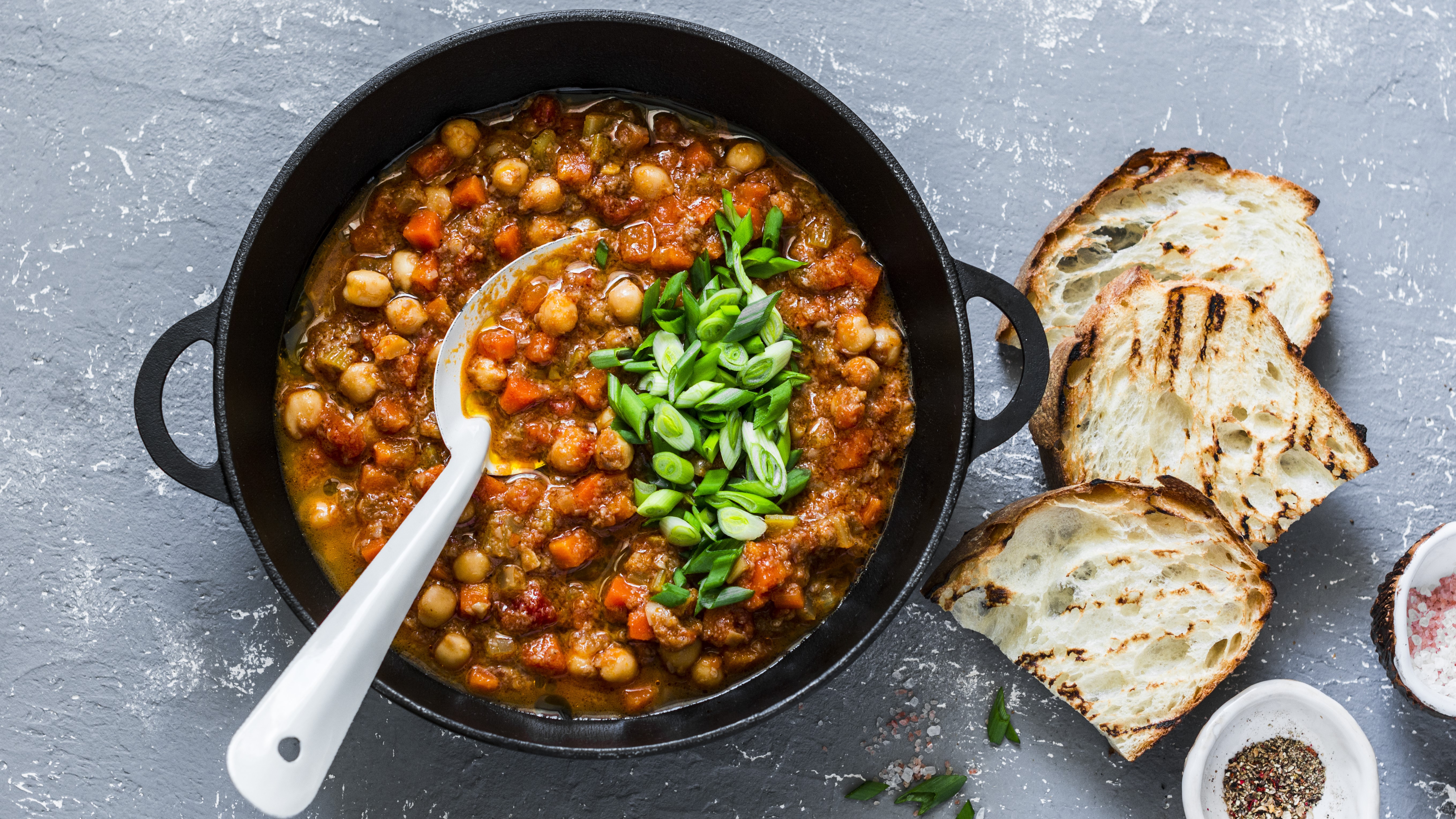 bowl of chickpea soup with bread