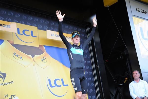 Bradley Wiggins (Team Sky) salutes the crowd on the podium