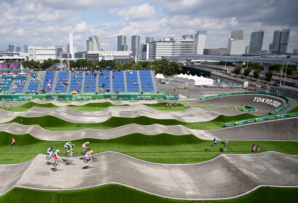 TOPSHOT Cyclists compete in the cycling BMX racing mens quarterfinals run at the Ariake Urban Sports Park during the Tokyo 2020 Olympic Games in Tokyo on July 29 2021 Photo by Lionel BONAVENTURE AFP Photo by LIONEL BONAVENTUREAFP via Getty Images