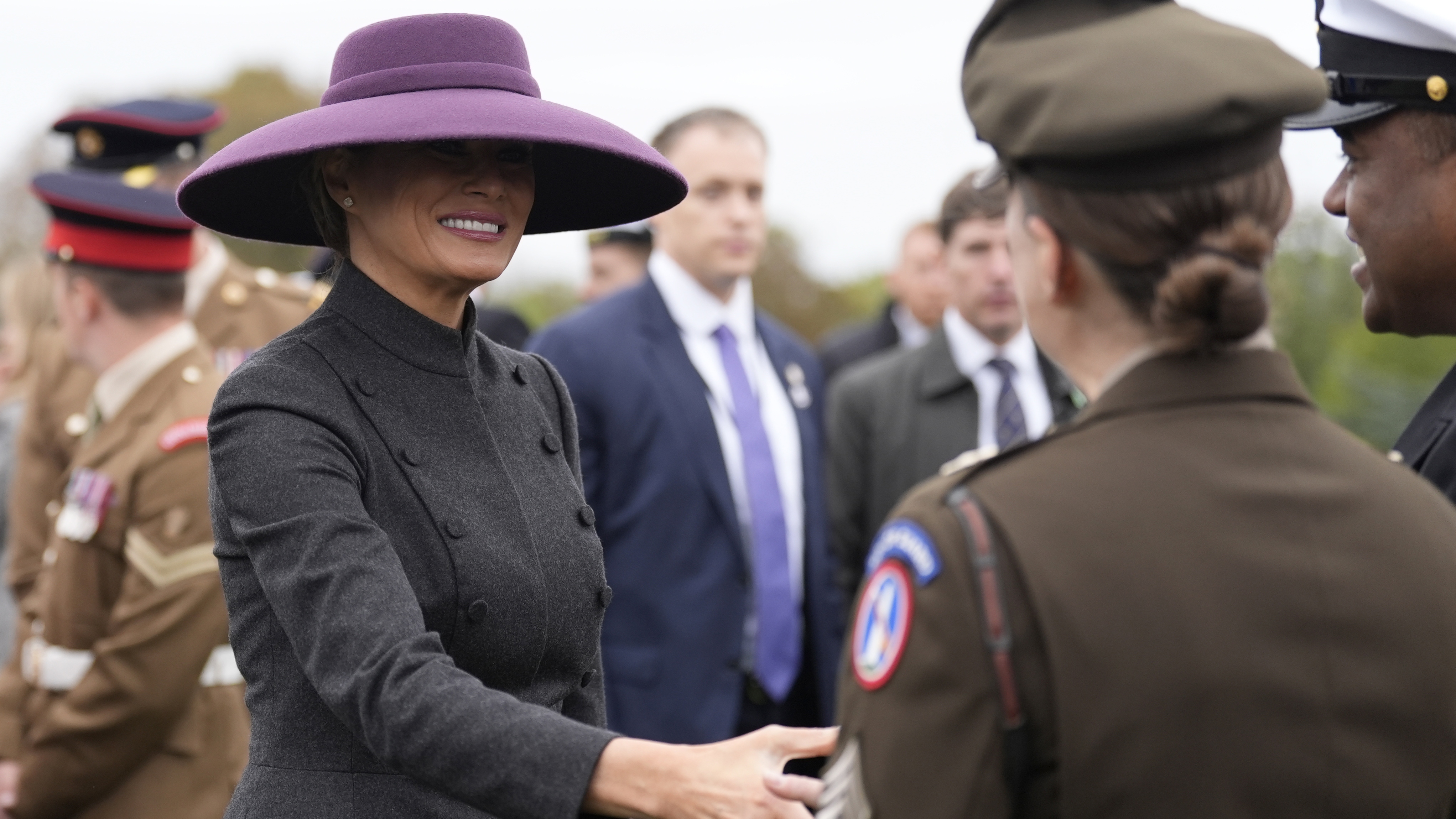 First Lady Melania Trump meets members of the Armed forces following a Beating Retreat military ceremony at Windsor Castle