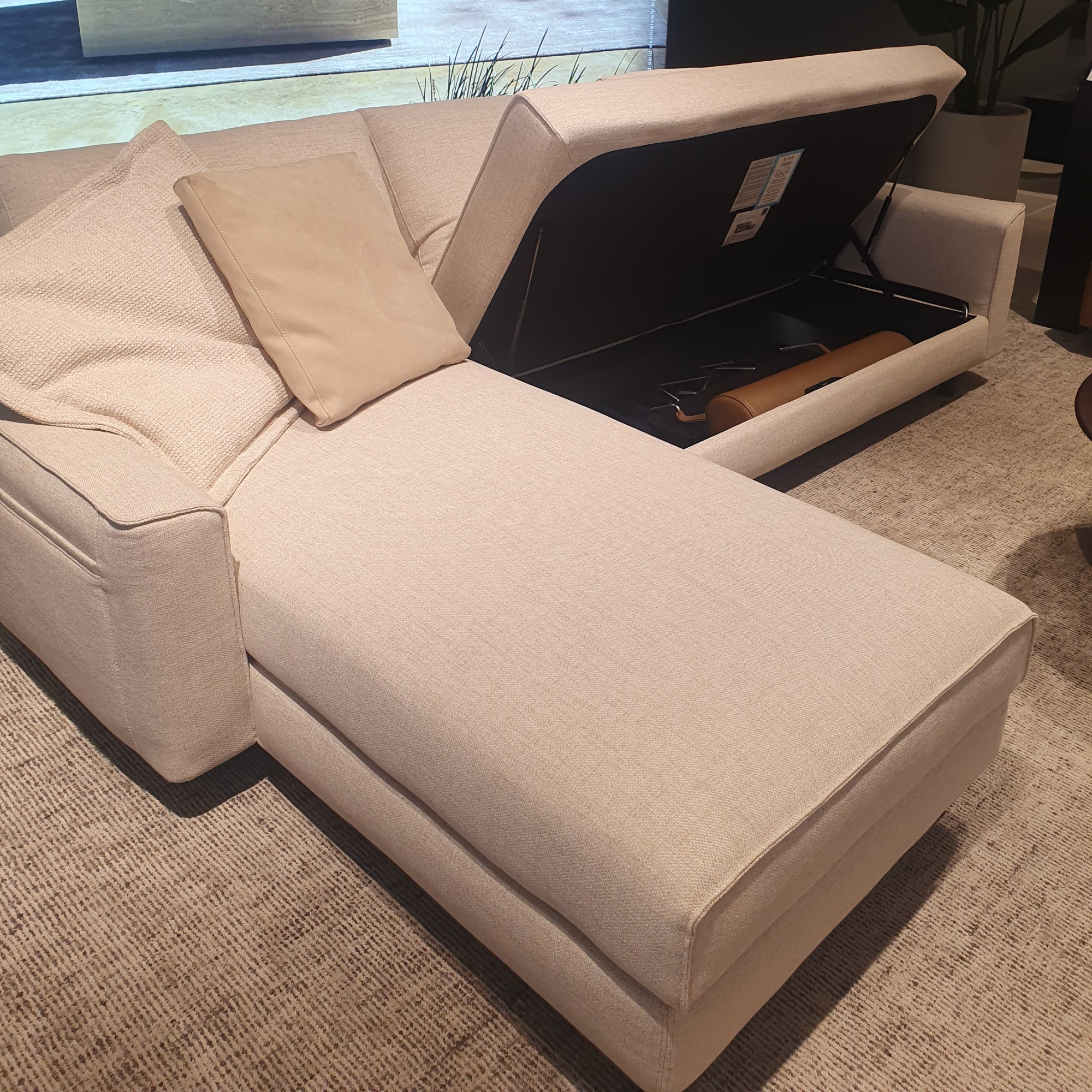 King Living Delta storage sofa at the brand's London showroom