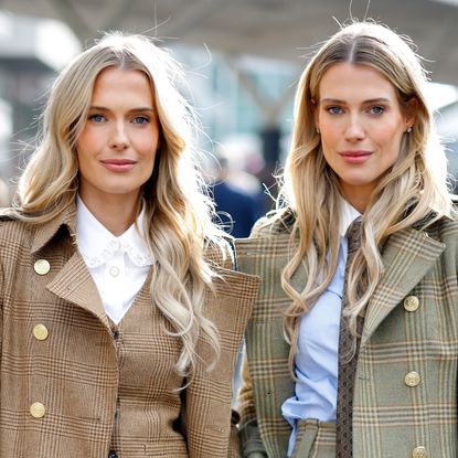 Amelia and Eliza Spencer in plaid coats and trousers at Cheltenham races