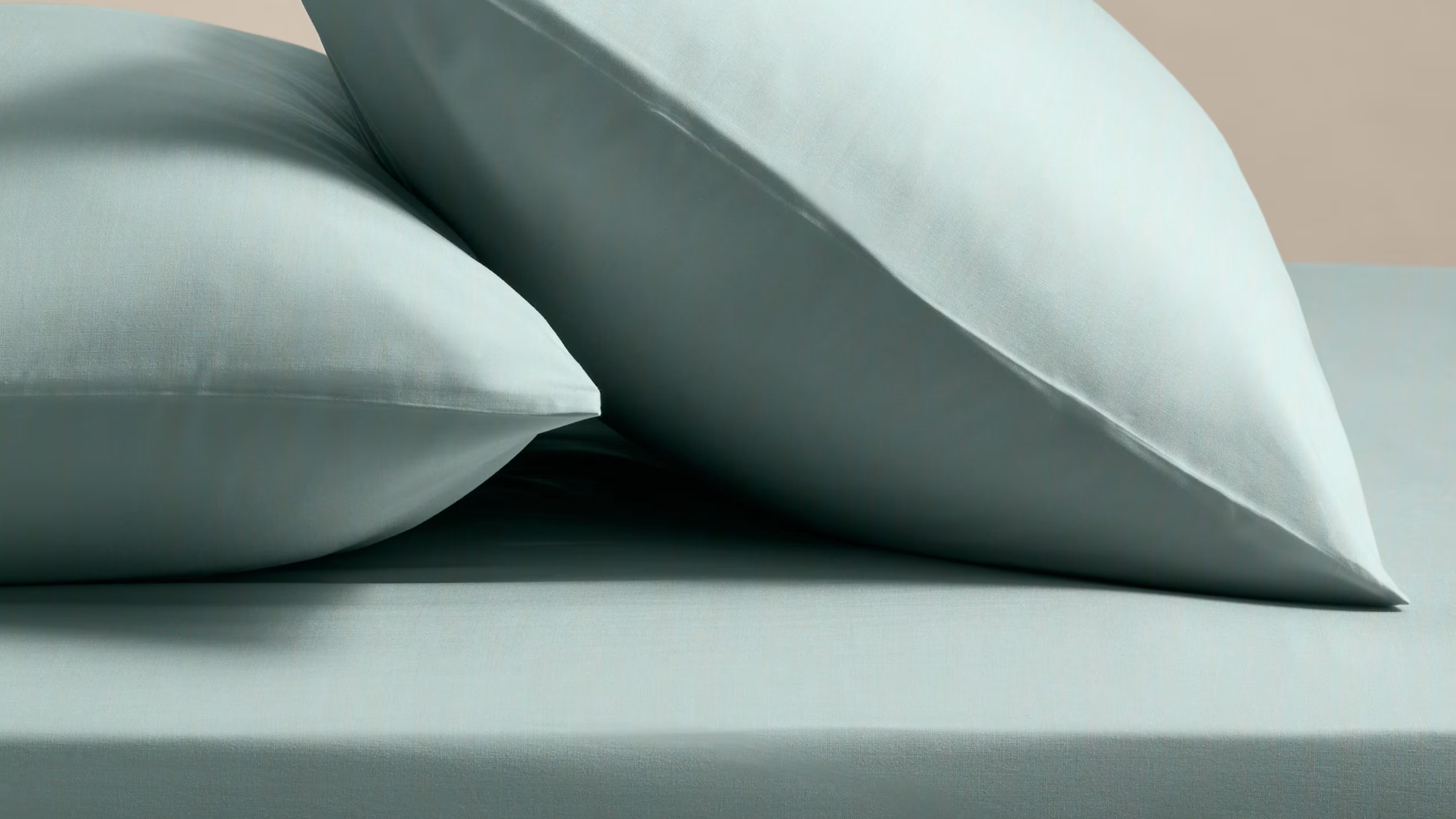 close up of light blue bedding 
