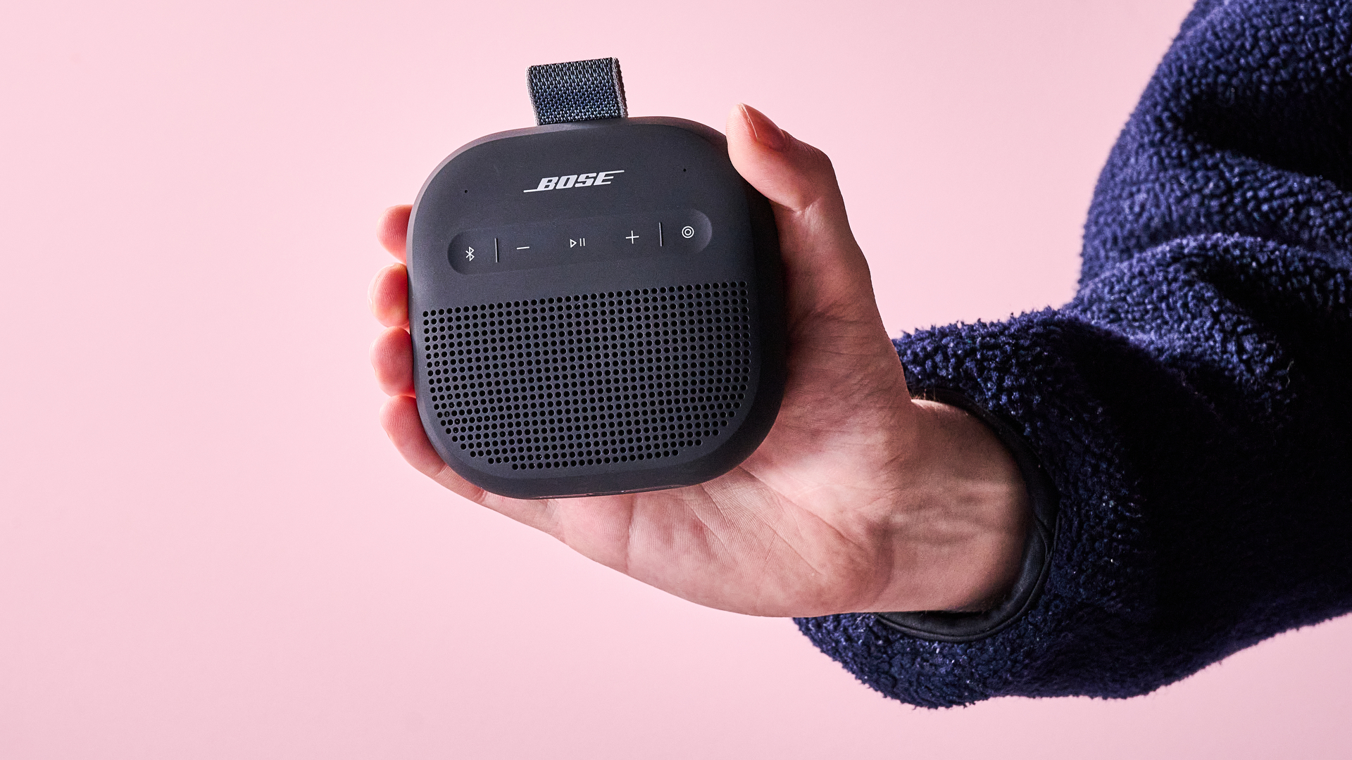 Man holding the Bose SoundLink Micro Gen 2
