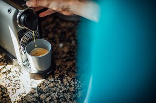 Image shows rider making a coffee.