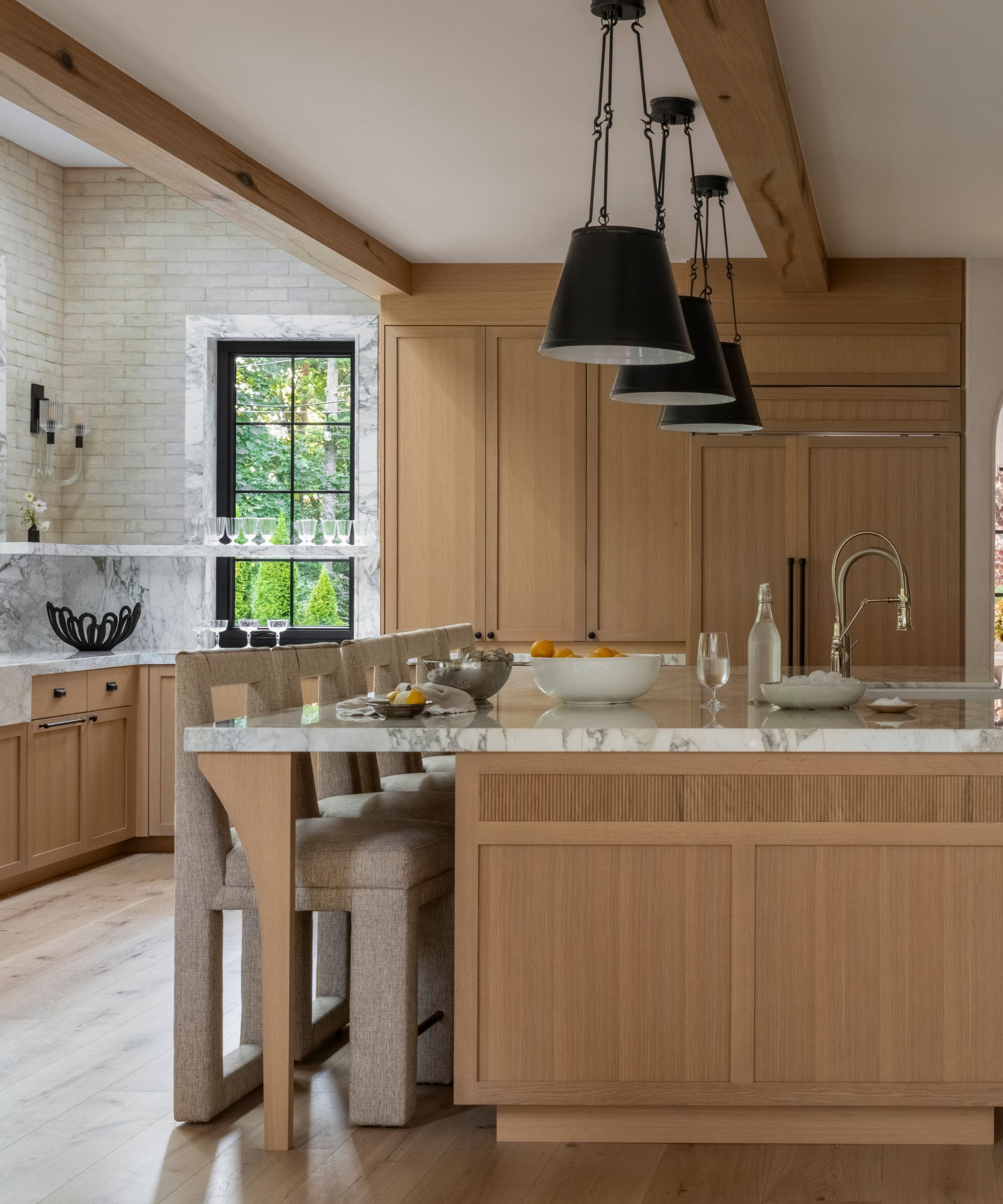 A kitchen with staggered ceiling heights