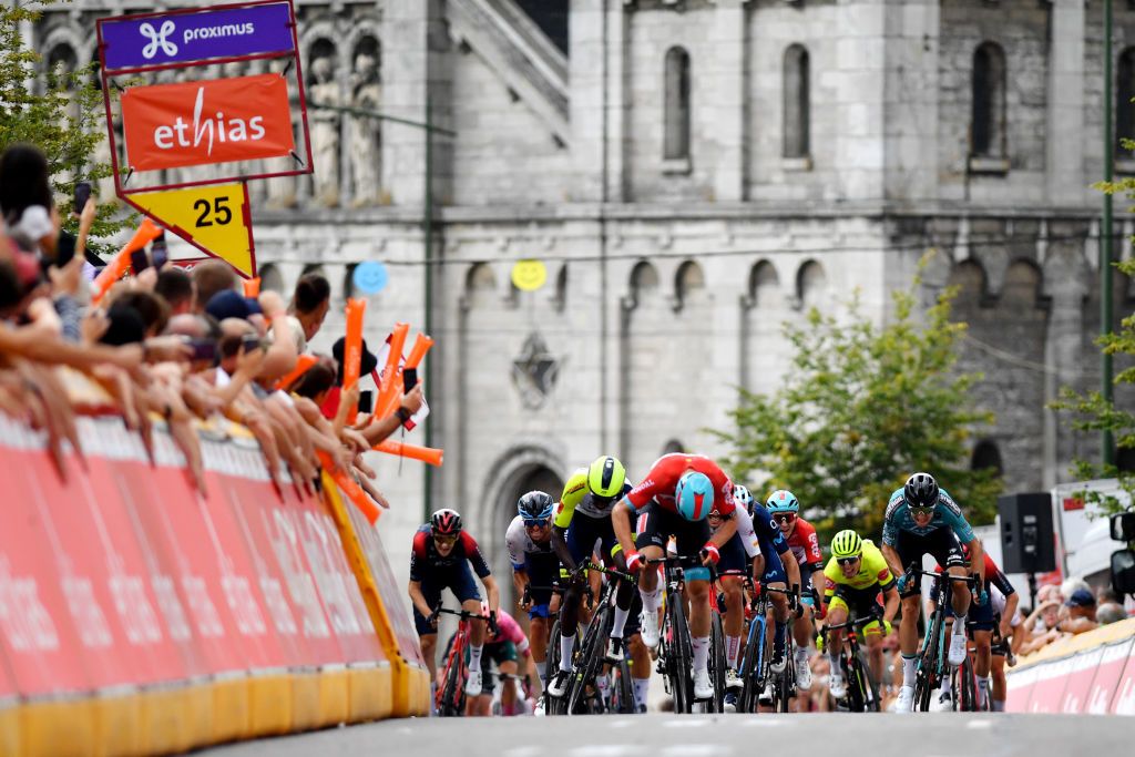 ROCHEFORT BELGIUM JULY 25 Arnaud De Lie of Belgium and Team Lotto Soudal sprints to win ahead of Hailu Biniam Girmay of Eritrea and Team Intermarch Wanty Gobert Matriaux during the 43rd Ethias Tour de Wallonie 2022 Stage 3 a 1956km stage from Vis to Rochefort ethiastourdewallonie22 on July 25 2022 in Rochefort Belgium Photo by Luc ClaessenGetty Images