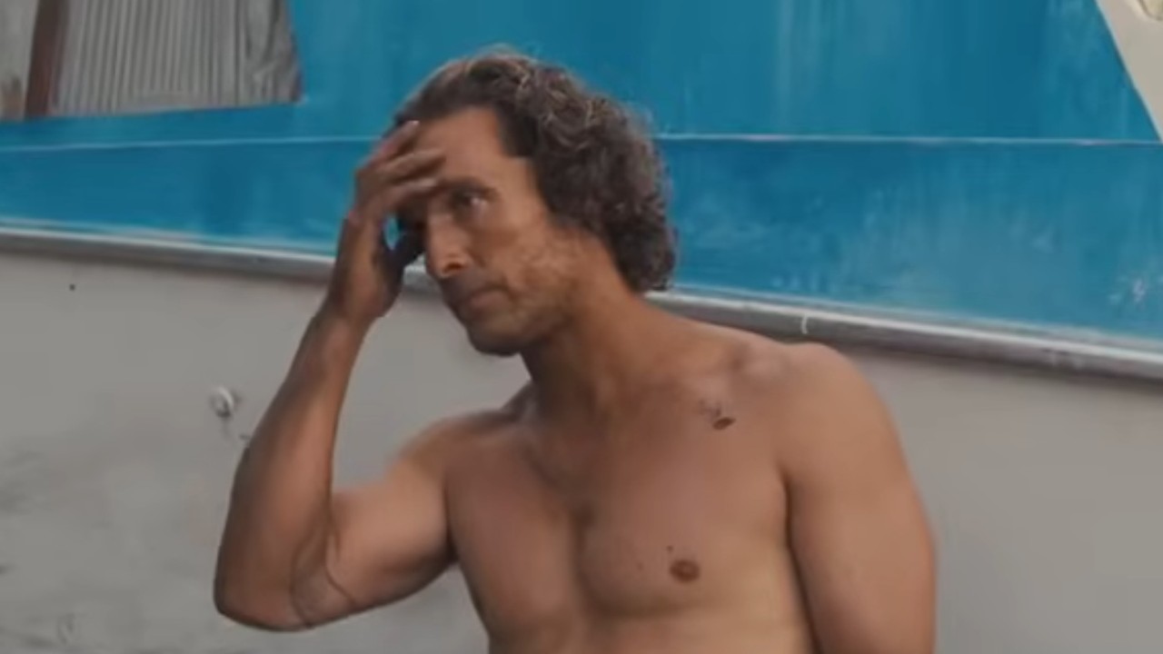 Matthew McConaughey putting his hand through his hair in Mud