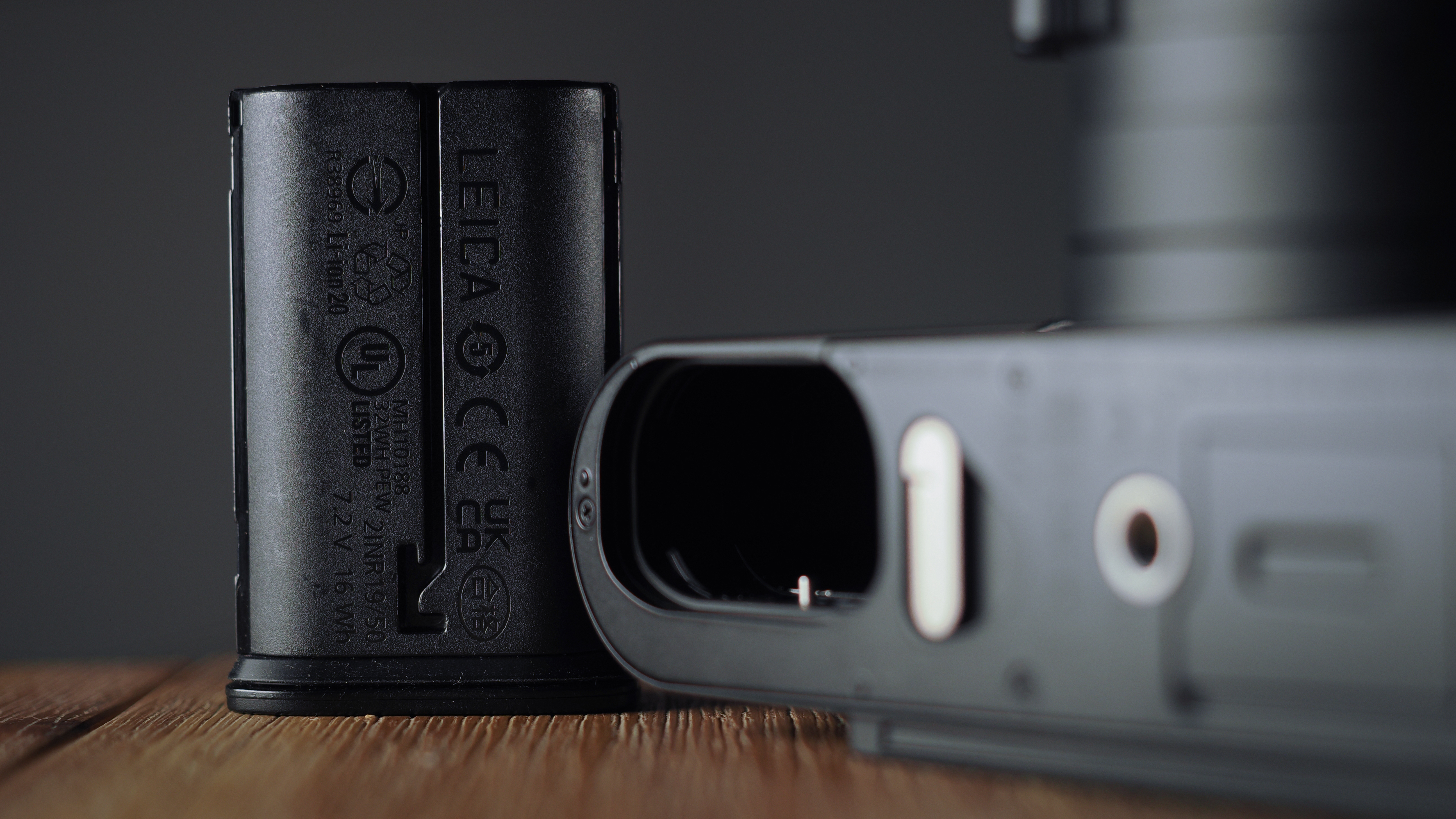 Leica Q3 Monochrom on a wooden surface