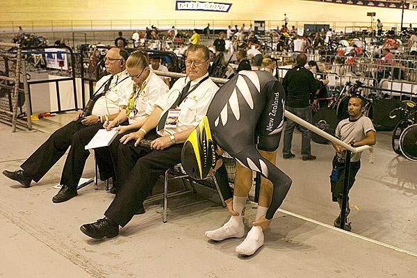 Jesse Sargent (New Zealand) warms up for his ride in the individual pursuit under the watchful eye of an event judge.
