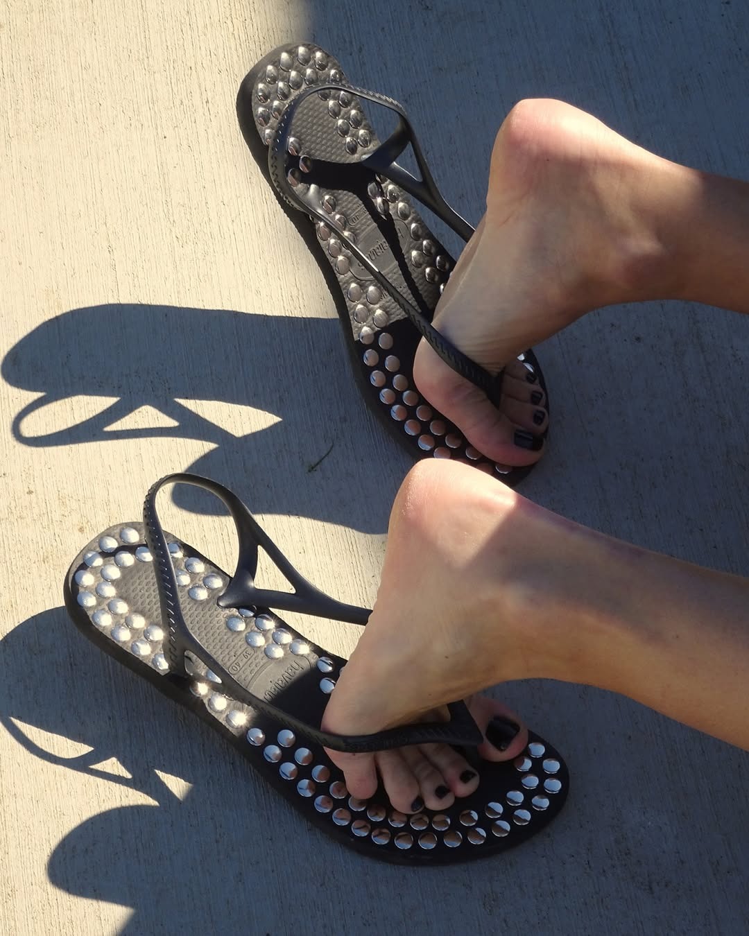 Photo of Havaianas x Gimaguas studded collaboration black embellished sandal.