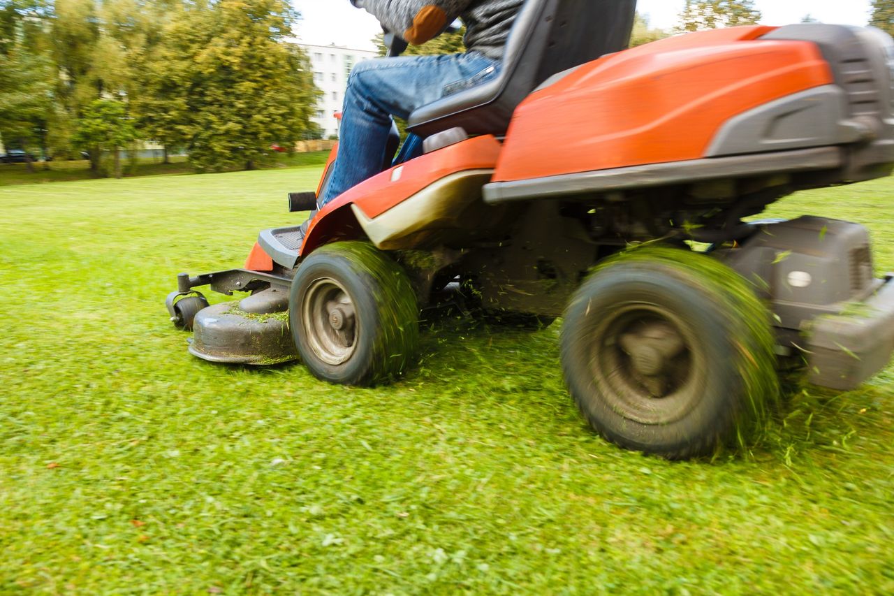 Ride-on mower attachments for yard