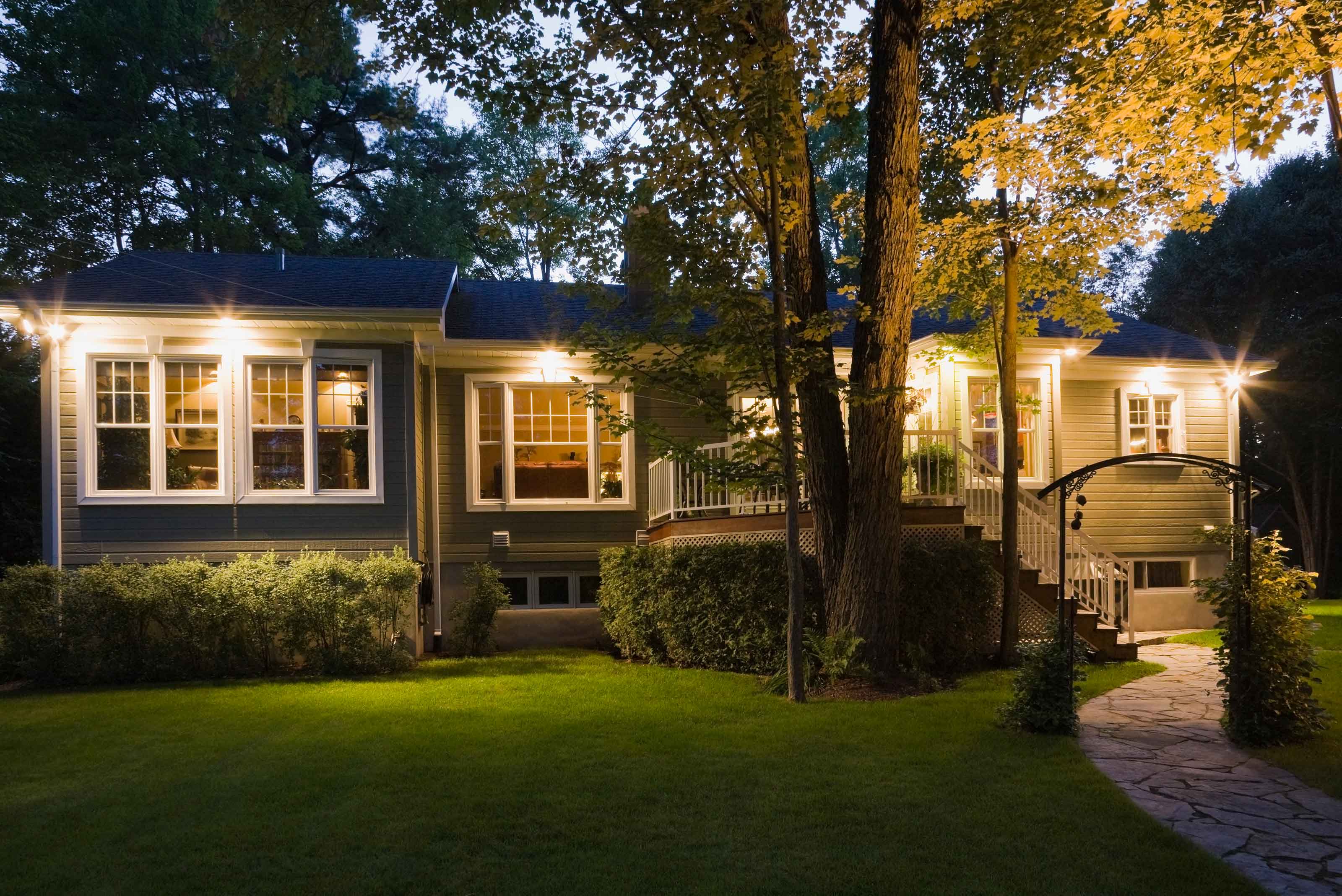 house with exterior lighting at night