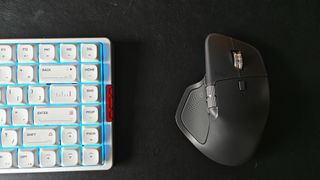 The Logitech MX Master 4 mouse, from different angles.