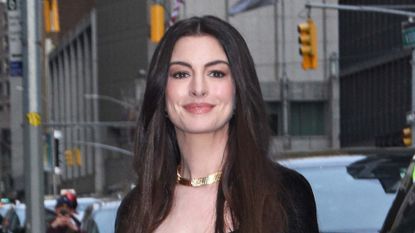 Anne Hathaway carrying JW PEI handbag from Amazon on April 15, 2026 in New York City