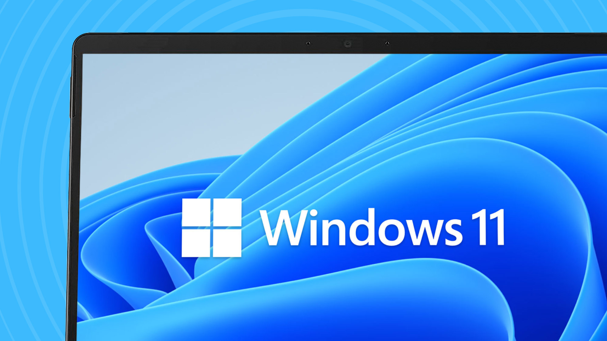 Windows 11 logo on a laptop with blue background